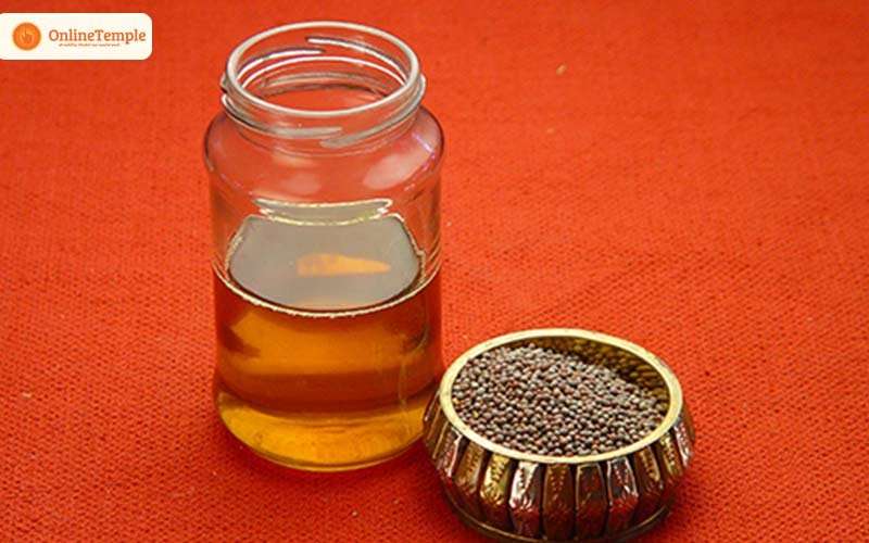 Offer Lord Shani Mustard Oil and Sesame Seeds